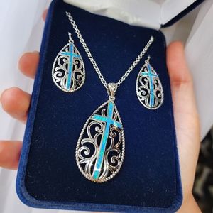 Montana silversmith western cross necklace earrings jewelry opal